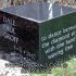 gross black granite modern cube gravestone