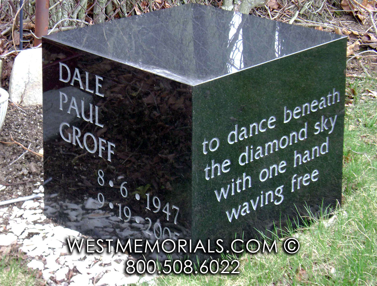gross black granite modern cube gravestone