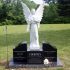 brown angel black granite grave monument