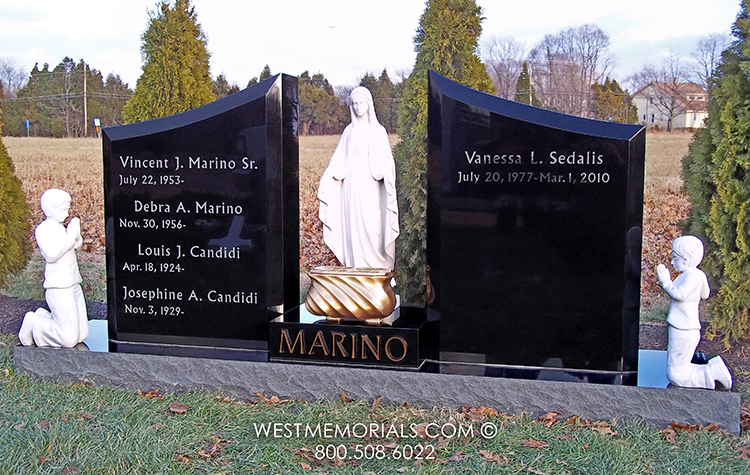 marino custom black family monument with white marble angels