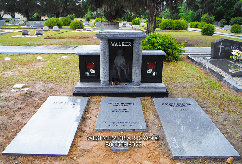 walker family headstone with columns and roses